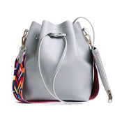 Women's PU Leather Bucket Bag With Colorful Strap